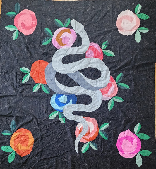 Quilt top with snake and roses 